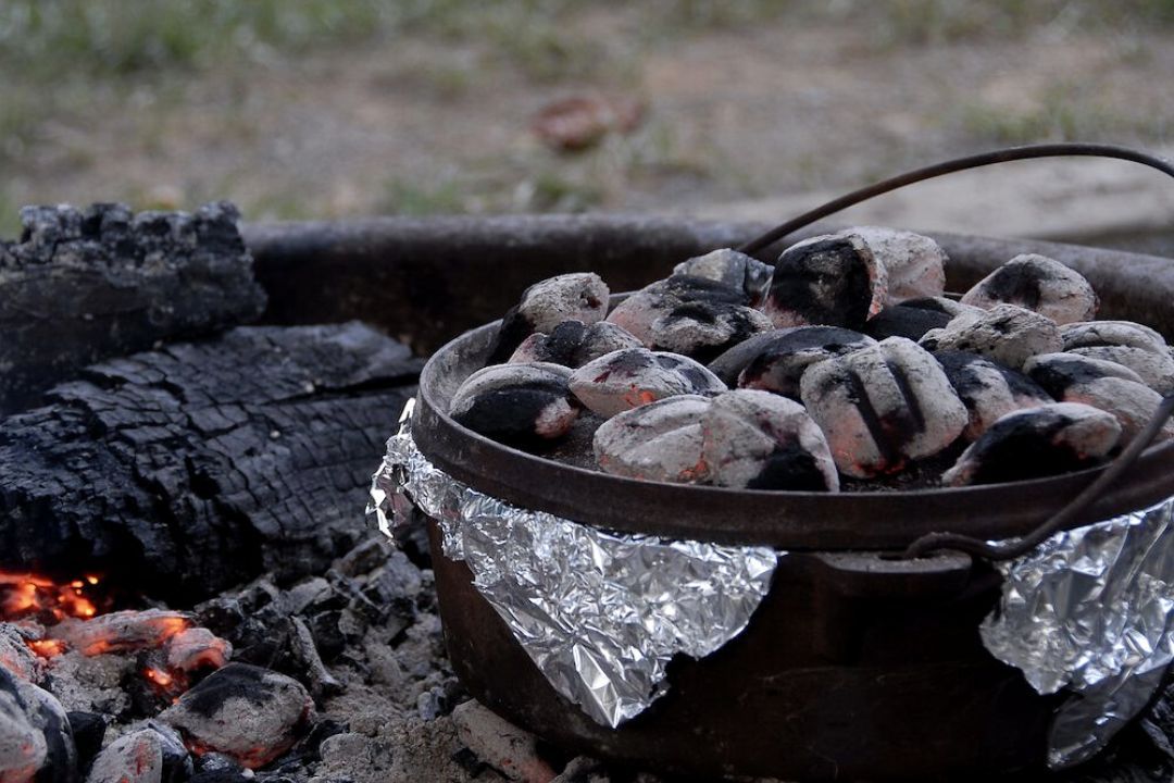 Dutch oven with charcoal.