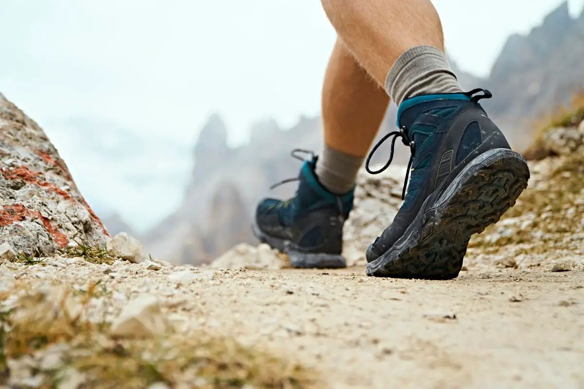 You need comfortable hiking boots for your flat feet.