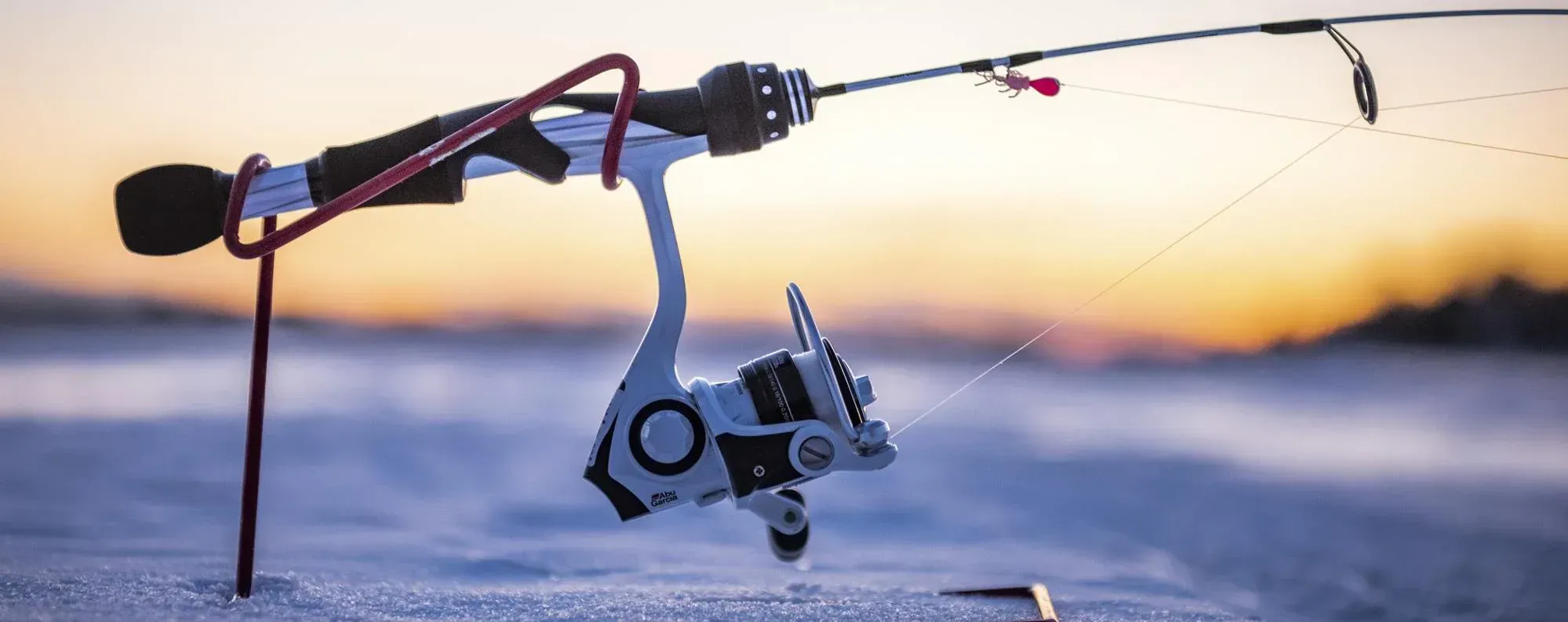 A simple ice fishing rod holder stand