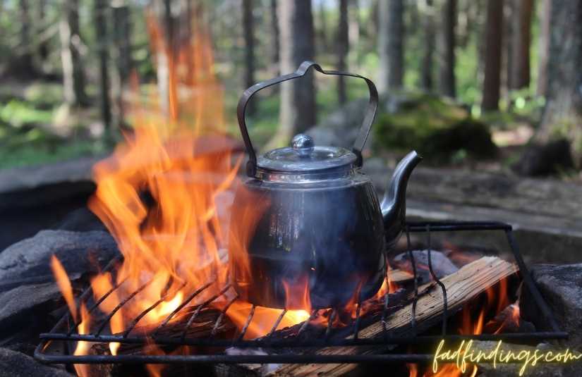 boiling water on a campfire