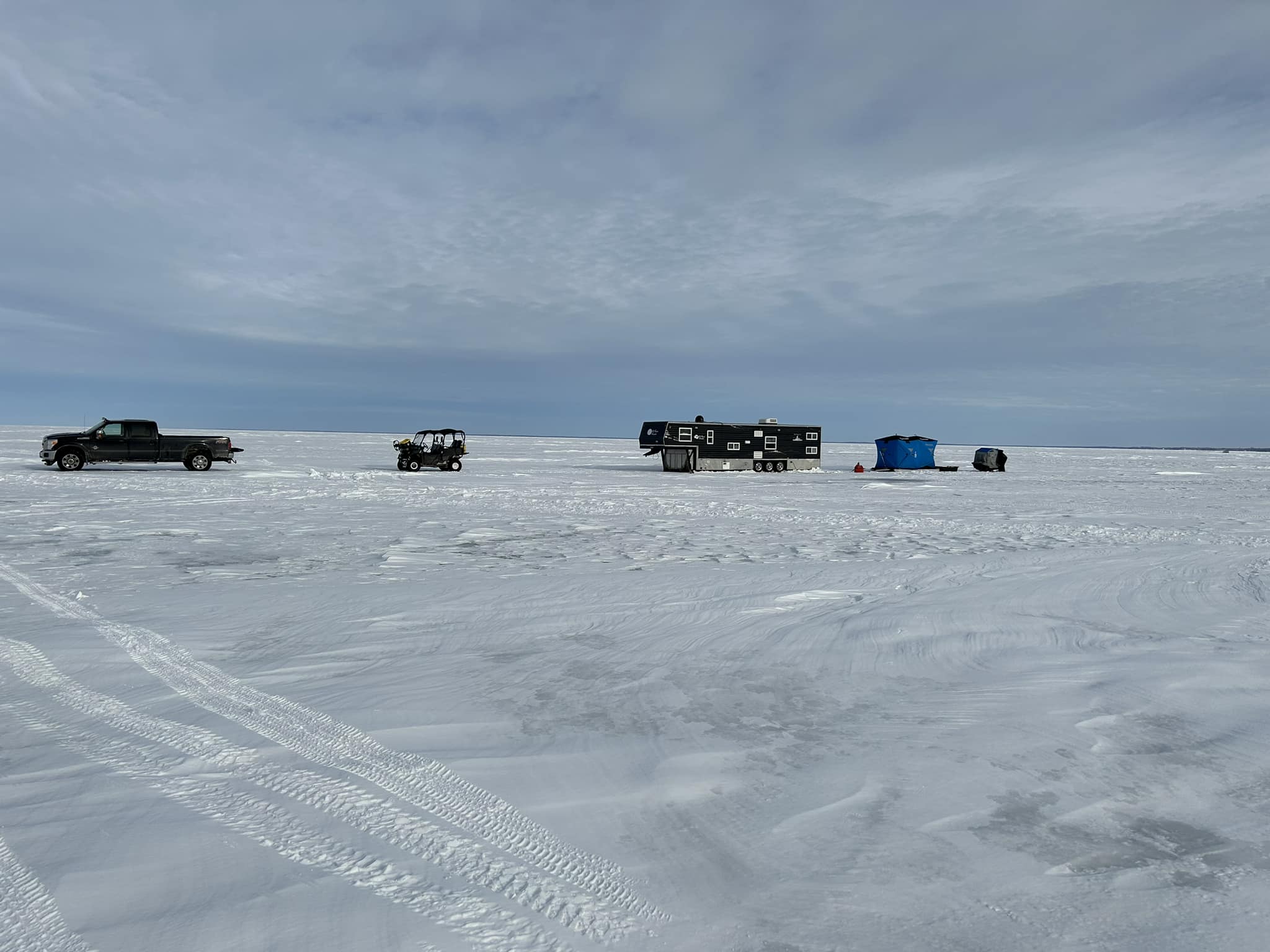 Fish Houses being dragged across the Lake Mille Lacs
